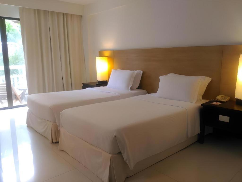מלון Karon Ramada By Wyndham Phuket Southsea מראה חיצוני תמונה